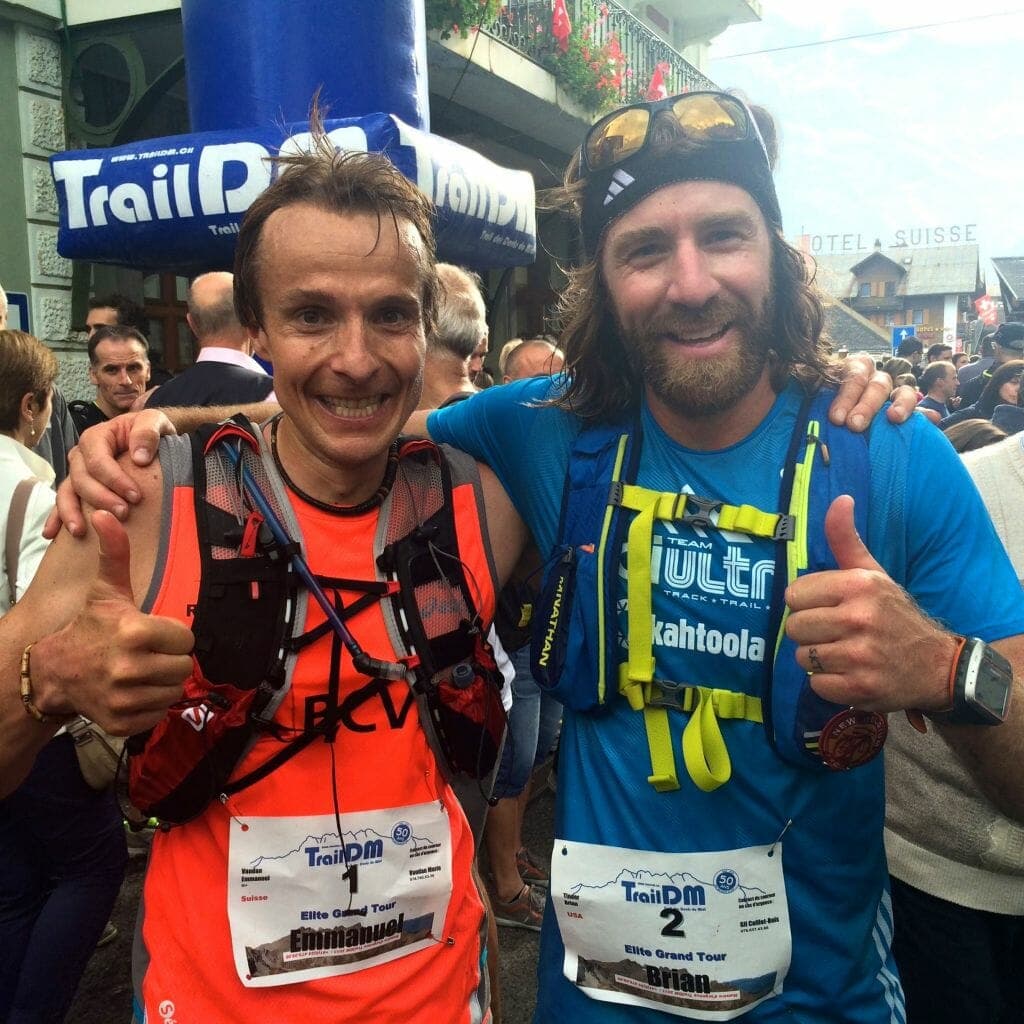 Emmanuel “Manu” Vaudan and Brian Tinder at the finish. Their bib numbers foreshadowed the result.