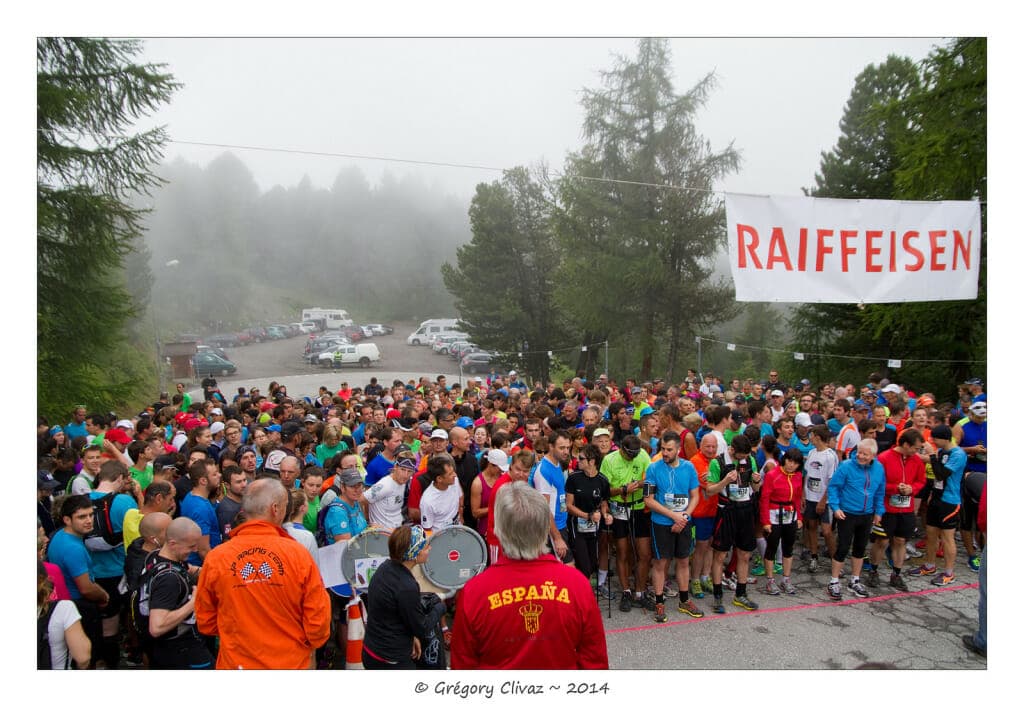 The tourist division gets ready for action. Note the remarkably gray view. It was the wettest July in 60 years in the Valais canton, where the race is held.