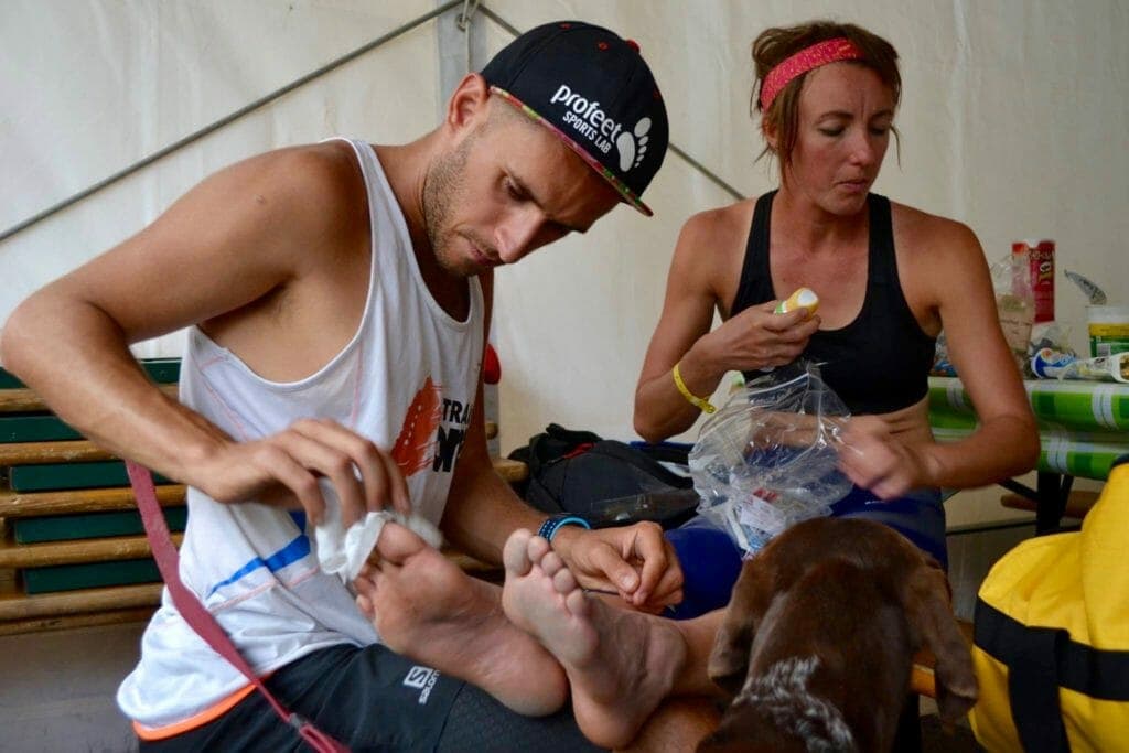 Natalie eats while Robbie lends a hand on the feet. (Photo courtesy of Majell Backhausen.)