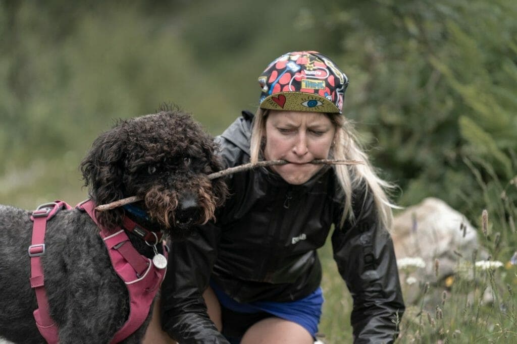 Martina Valmassoi playing with Izzy the Labradoodle. 