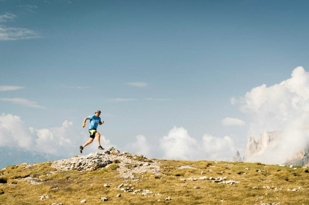 running over rocks discovering the best trail running shoes