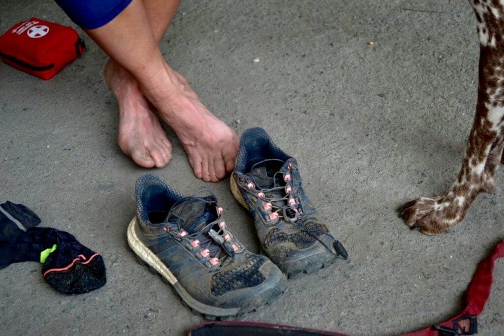 There are days when paws might be preferable to feet-- just ask Natalie and canine pal Rosa. (Photo courtesy of Majell Backhausen.)