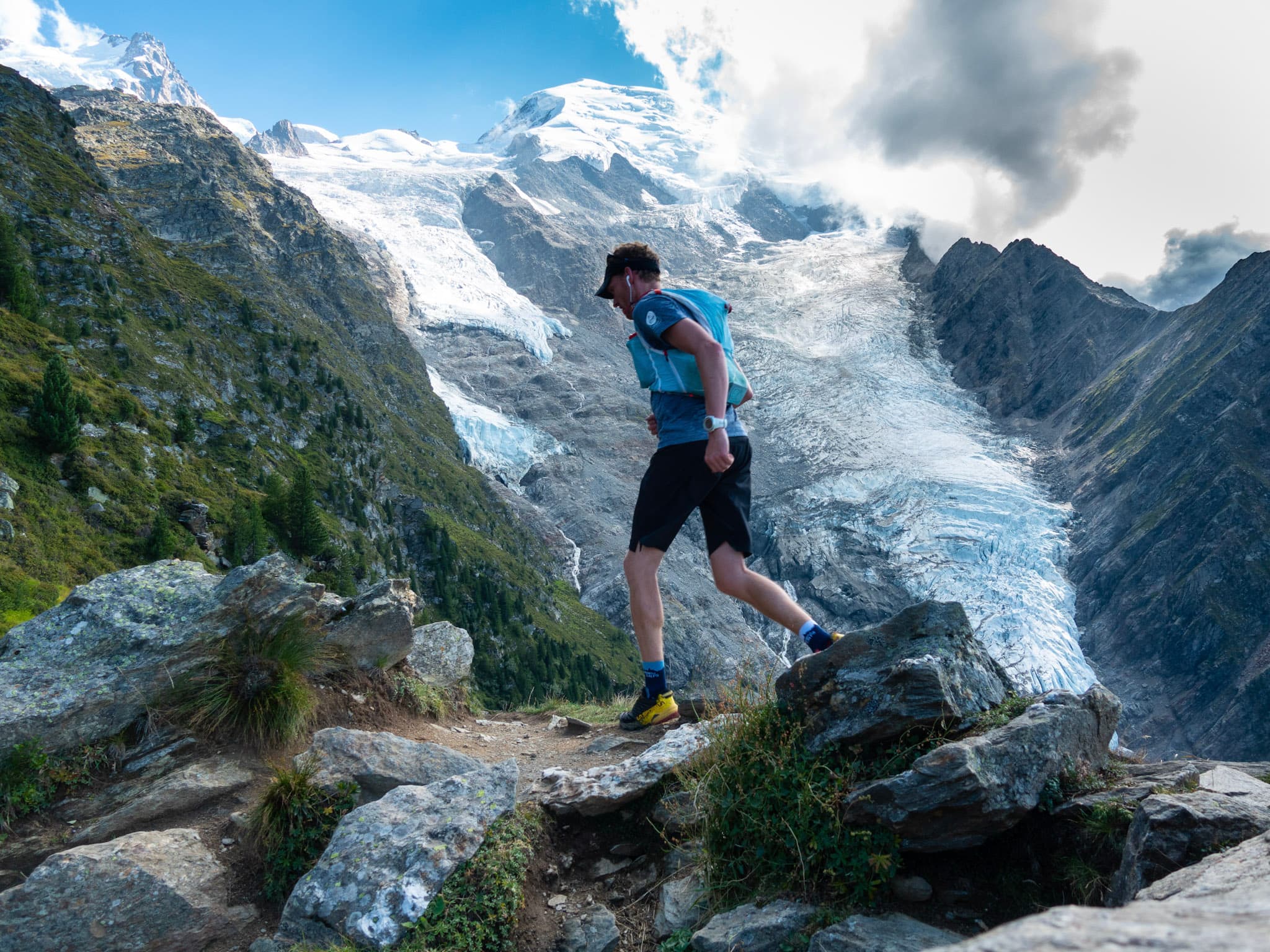 Runner with huge glacier in background