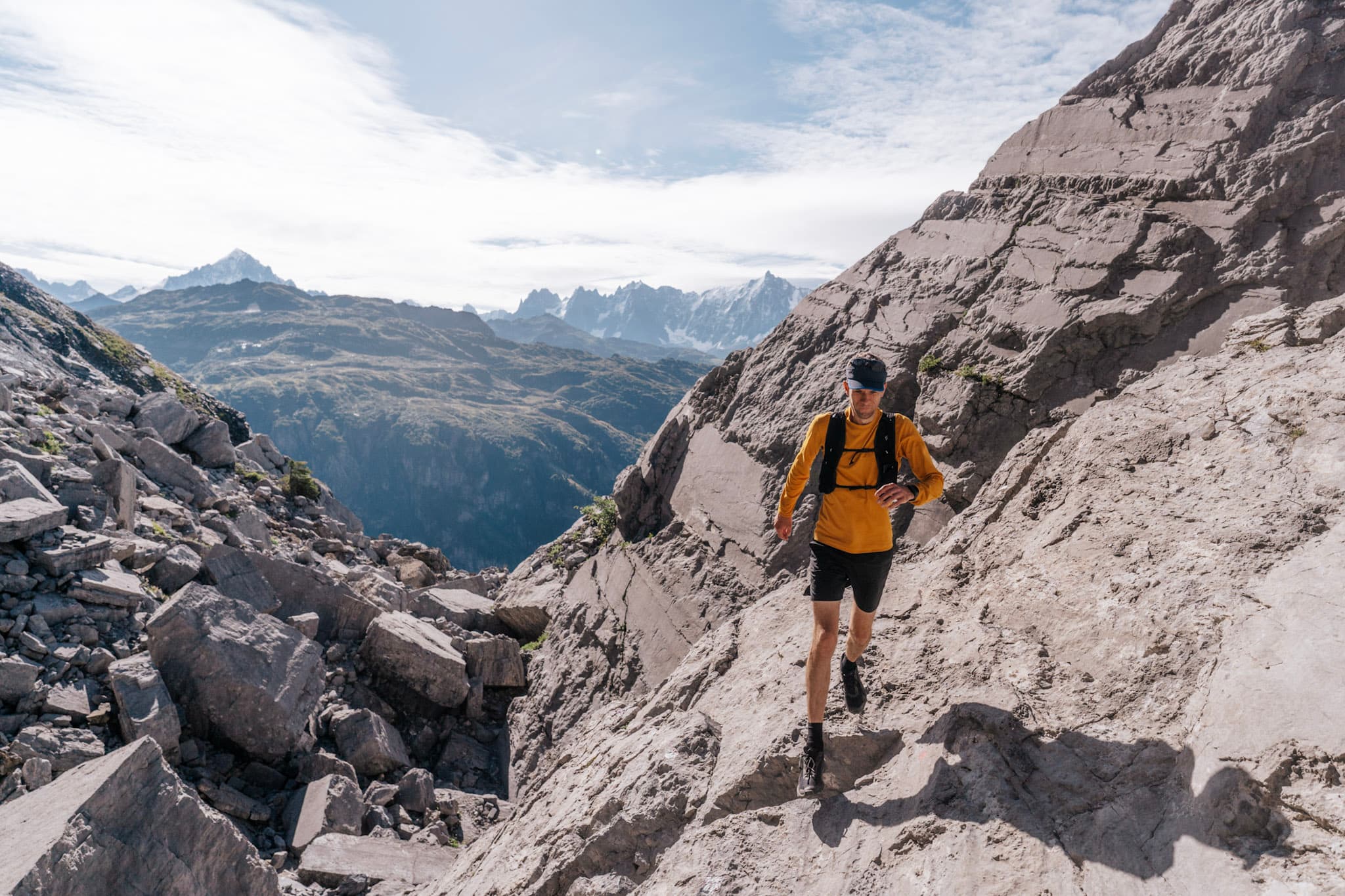 one runner runs over technical terrain