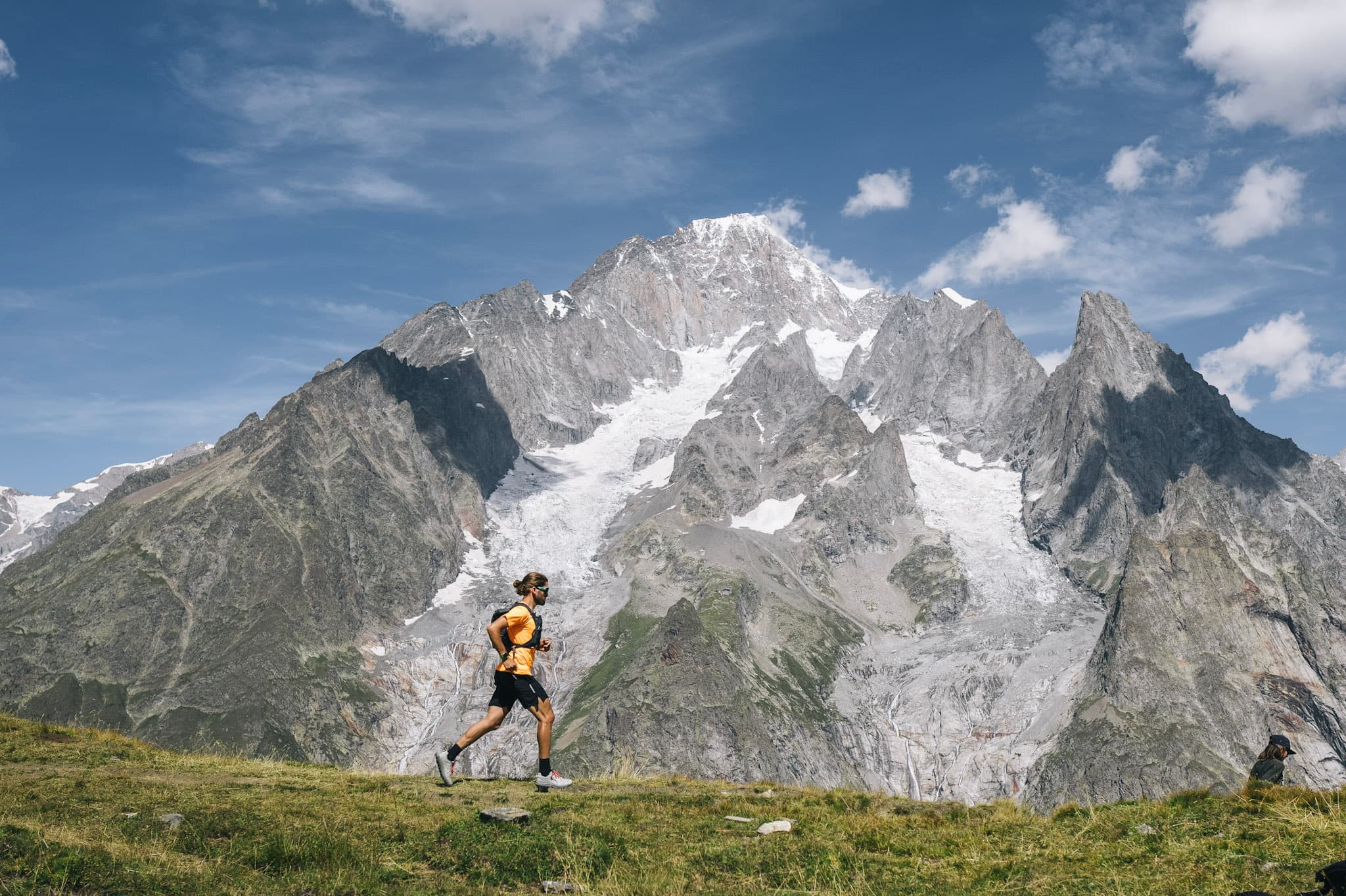 Runner with mountain and glacier in background