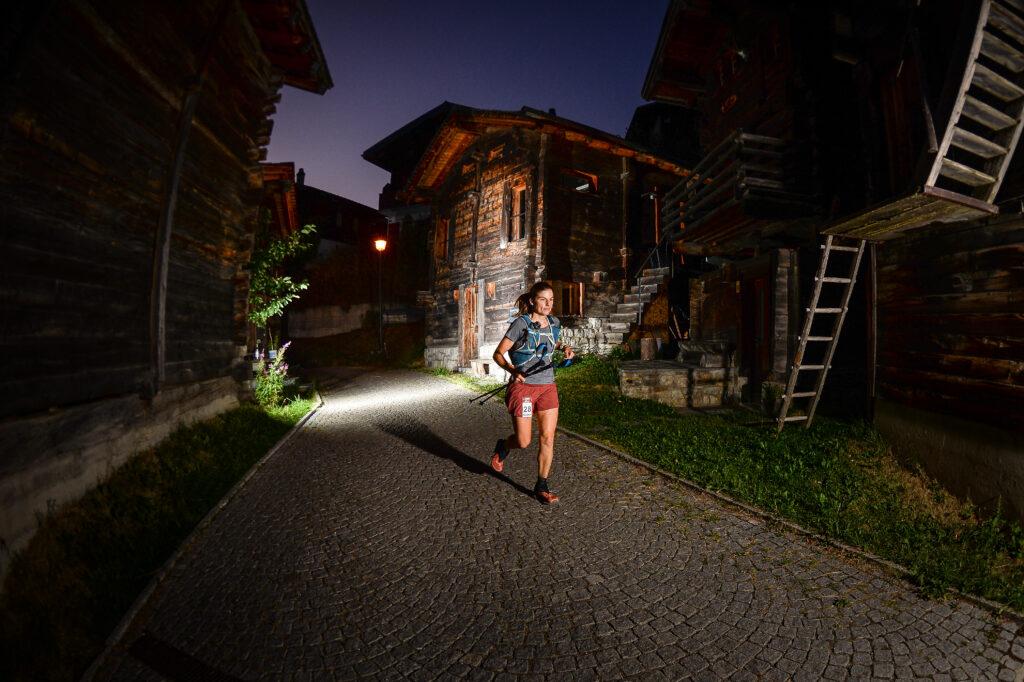 A runner passes through Bellwald during the night.