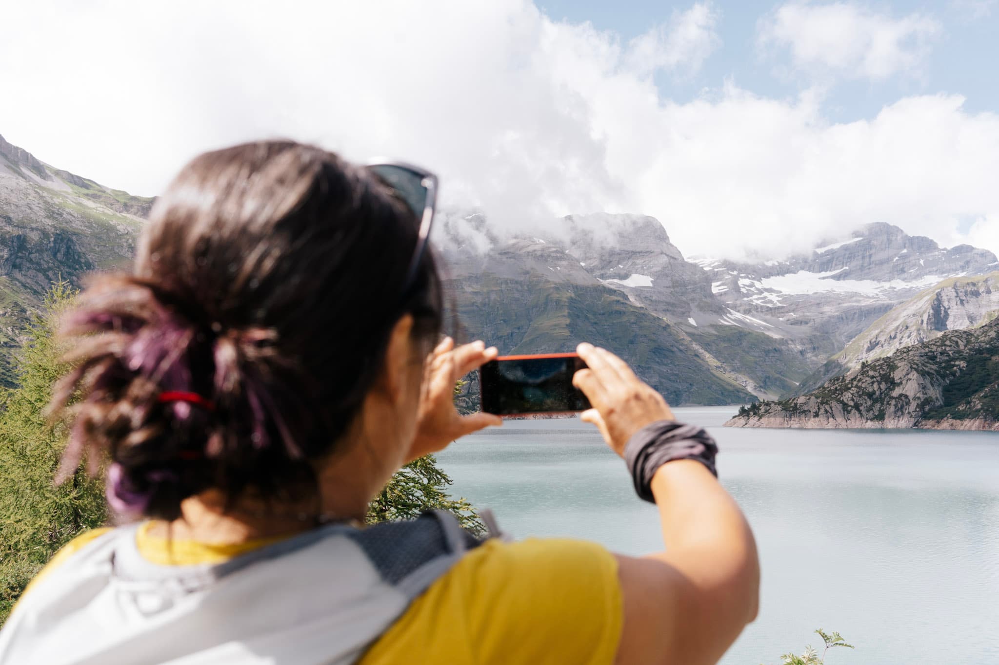 Runner takes photo of lake