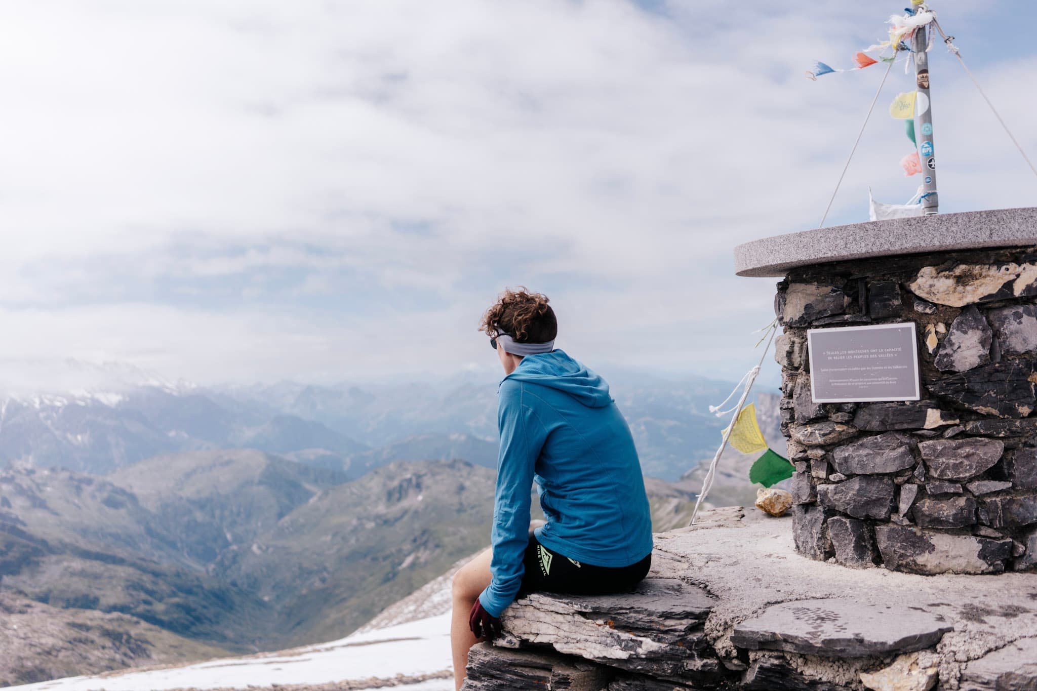 One runner looks out at view from Summit of Mountain