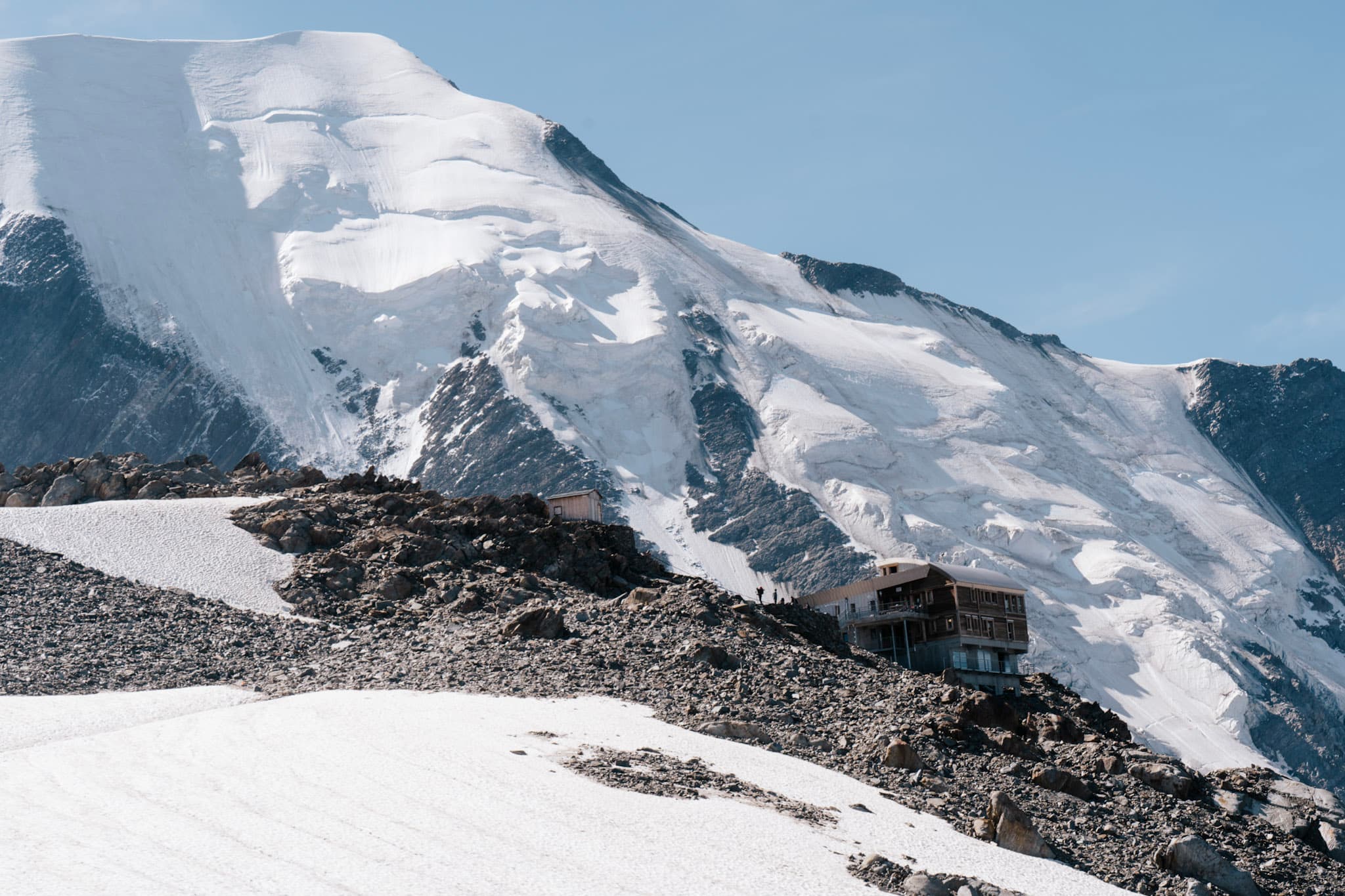 Tete Rousse mountain hut with Mont Blanc in the background