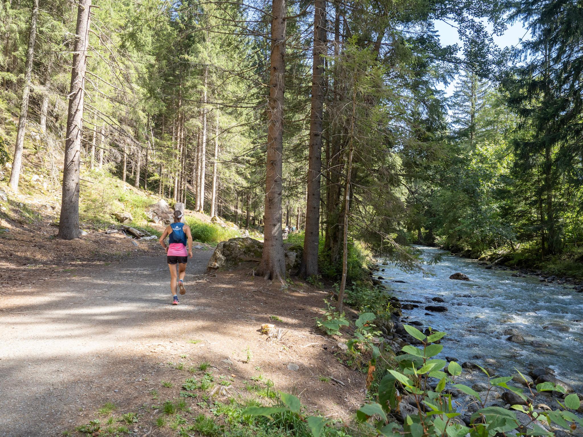 Runner runs along Riverside Trail in Forest