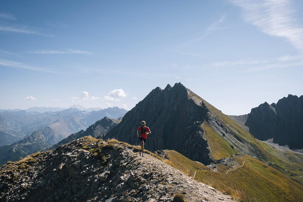 A male trail runner on the Mont Fortin Ridge in Aosta Valley, Italy.
