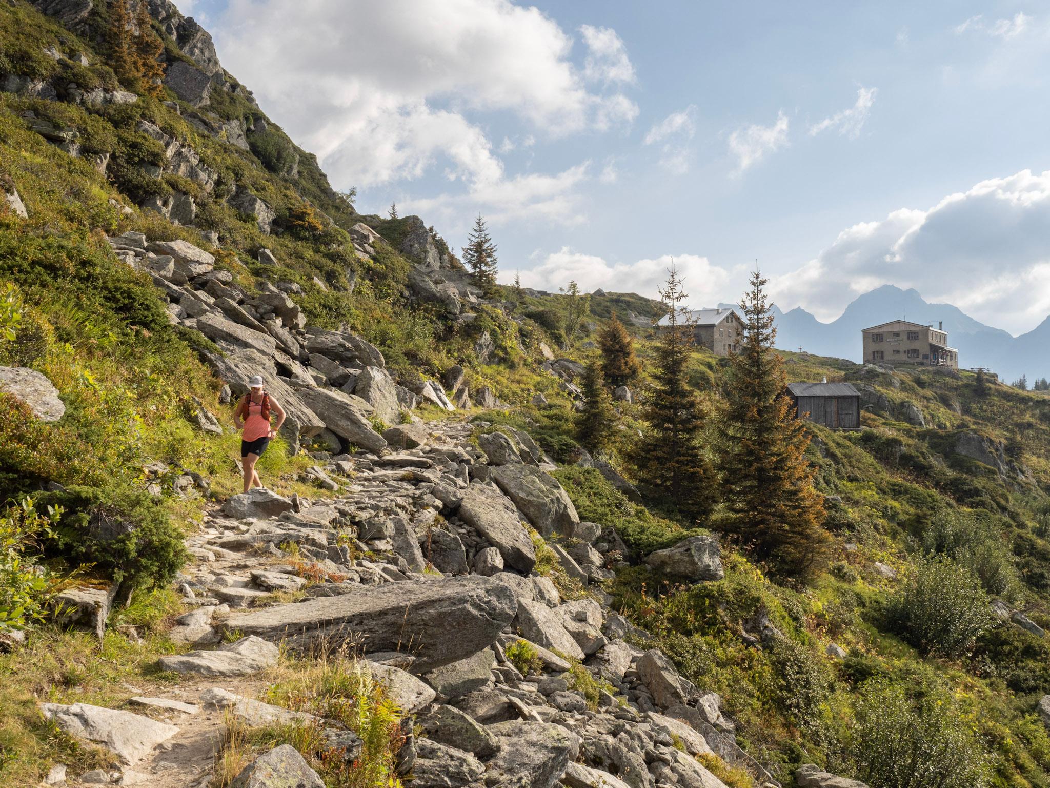 runner comes down technical rocky trails