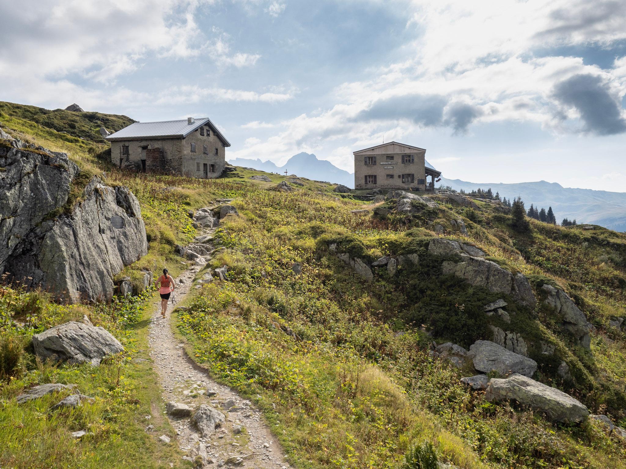 Runner approaches mountain hut