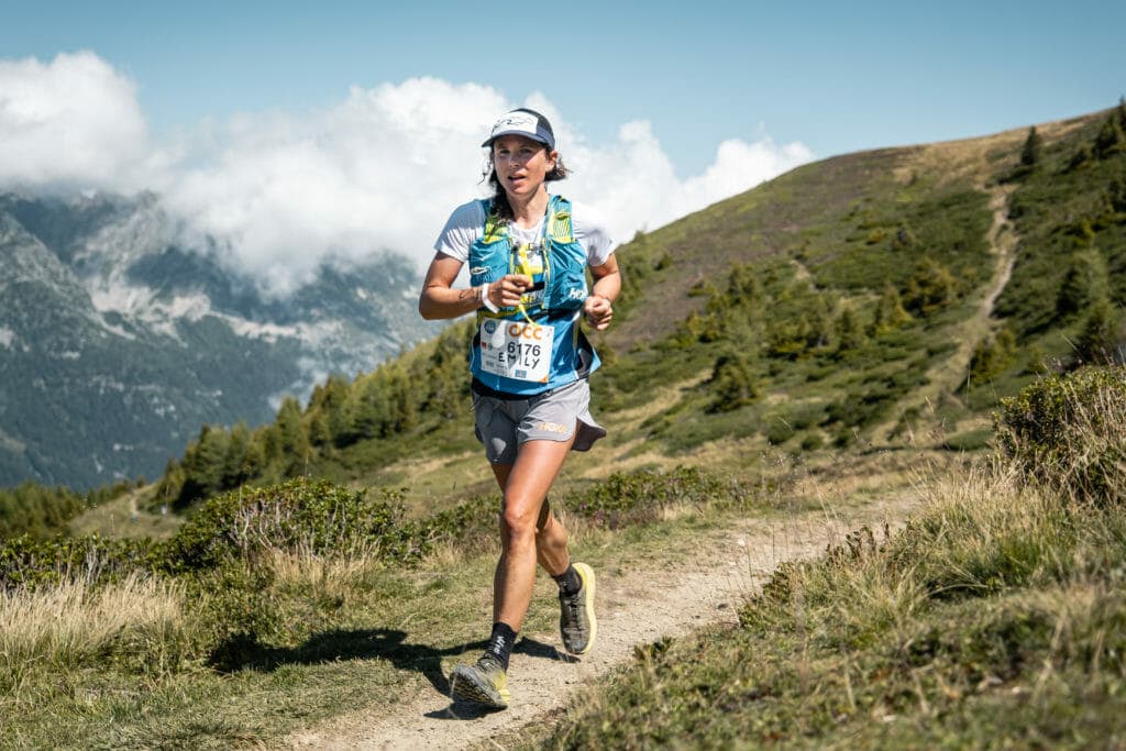 Emily Schmitz running on single track.
