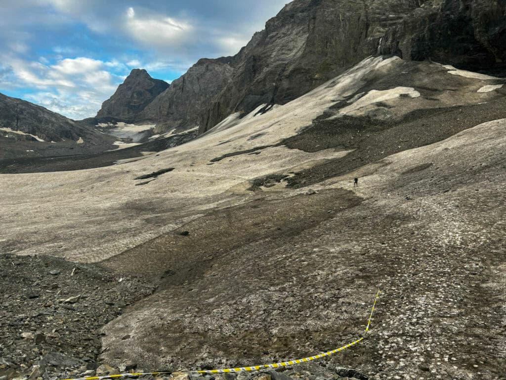 Doug descending from Hohturli pass at sunset