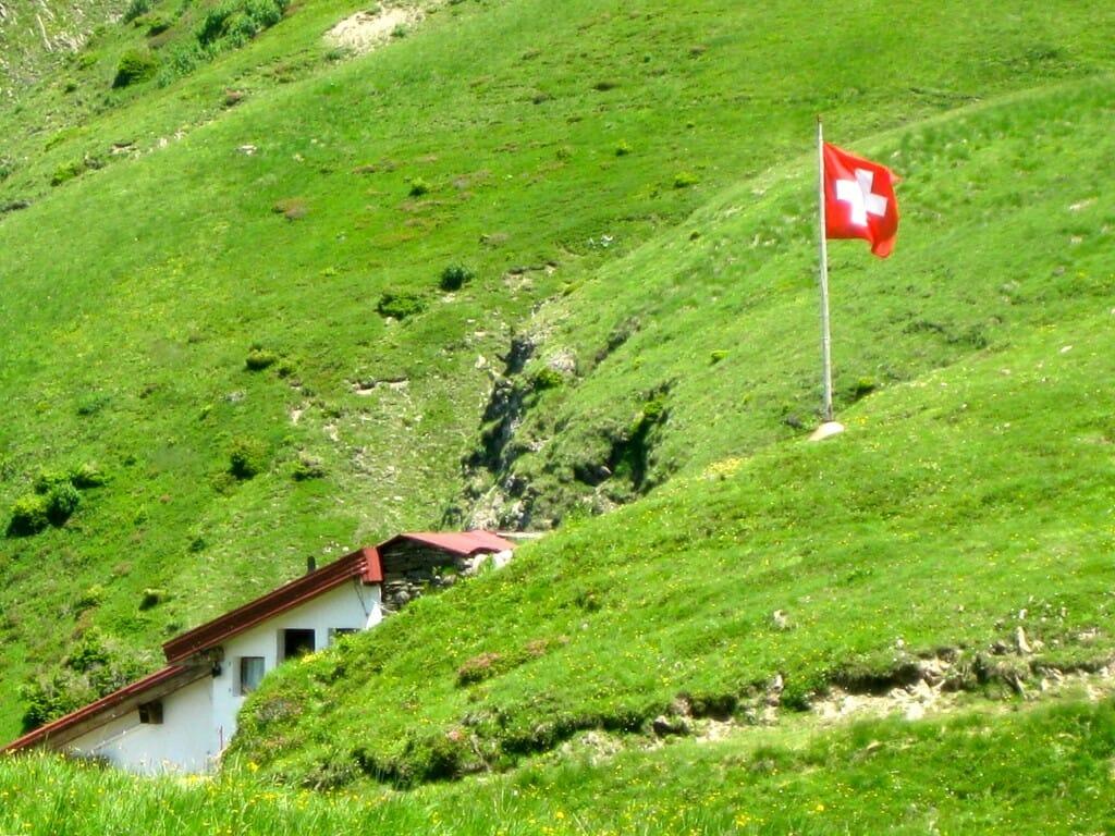 Look for the flag. You're likely to find cafe au lait, fresh bread and cheese. The Cabane Anthème, a favorite trail running stop above Champéry.