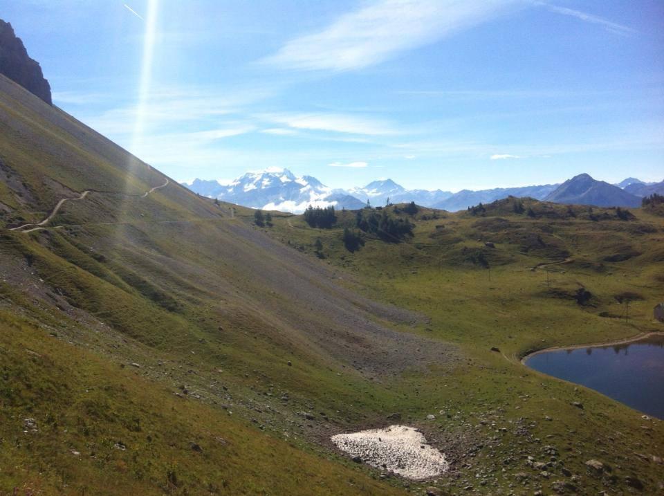 The last kilometer is a gift. The route tops out in the middle of the image, and follows the nearly-perfectly-flat gravel track. The Grand Combin looms in the distance, on Switzerland's border with Italy.