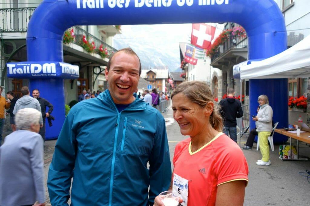 Still smiling, after 57 km: Connie Gardner with race committee member Gil Caillet-Bois.