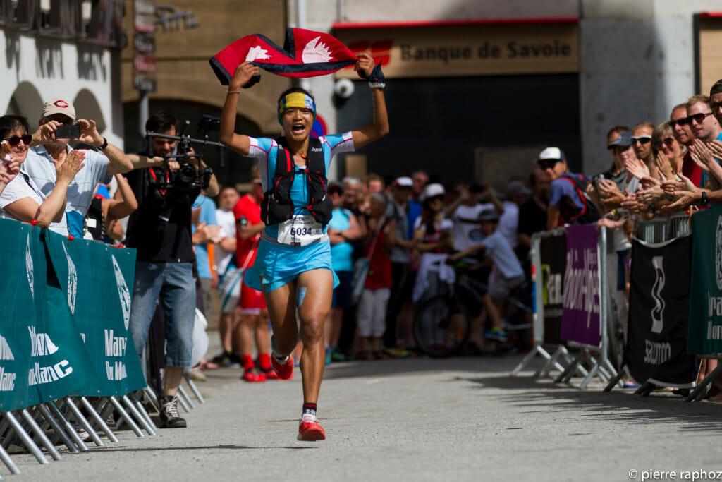 An exuberant Mira Rai rounds the corner and heads for the finish line in the Skyrunning 80 km. Photo courtesy of Infocimes, ©Pierre Raphoz .