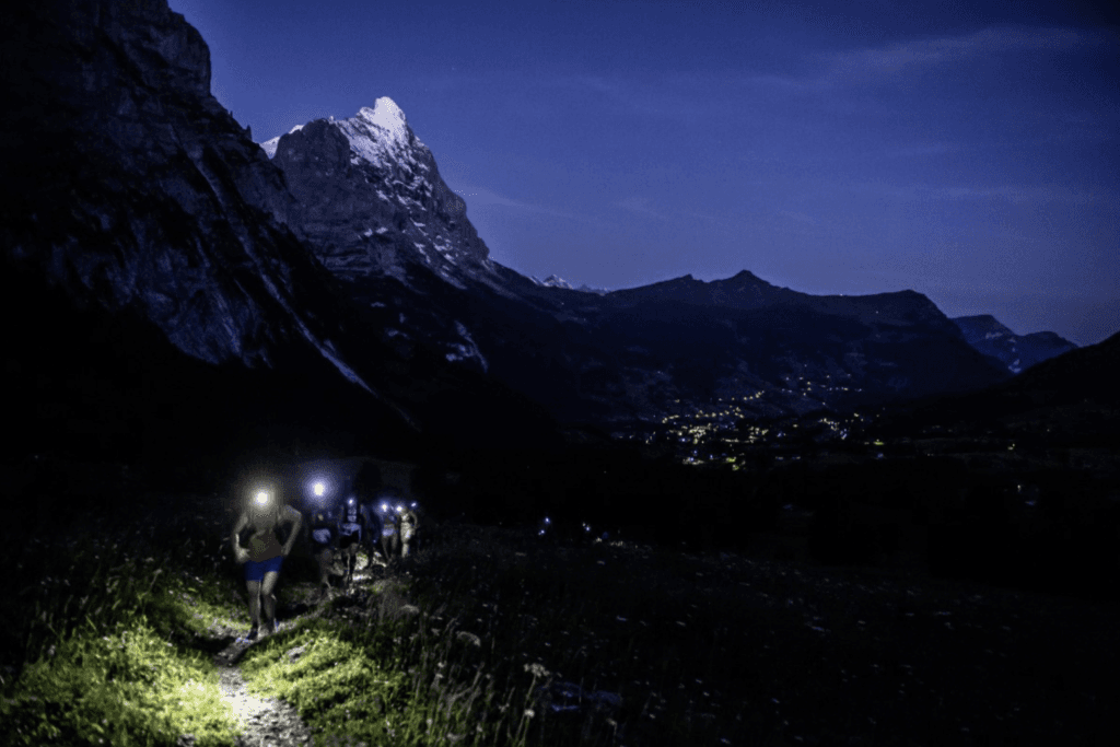 Eiger 101 racers get an early morning start, as they head for the hills from Grindelwald. (Photo courtesy of Eiger Ultra.)
