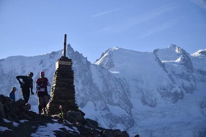 High atop a col in the Aiguilles Rouges Natural Reserve, runners take a break. (Photo courtesy of Christophe Angot/Photosports.)