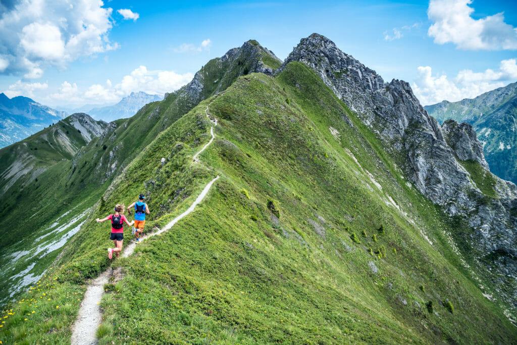 trail runners on a ridge above Le Tour, France.