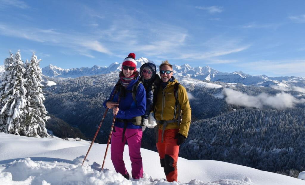 Bruno and his wife with kid at the back snowshoeing in the Aravis mountain range