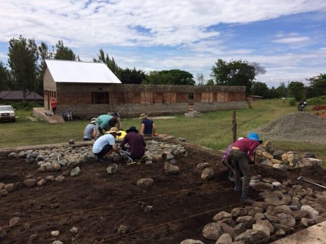 Volunteers building a secondary school in Tanzania.