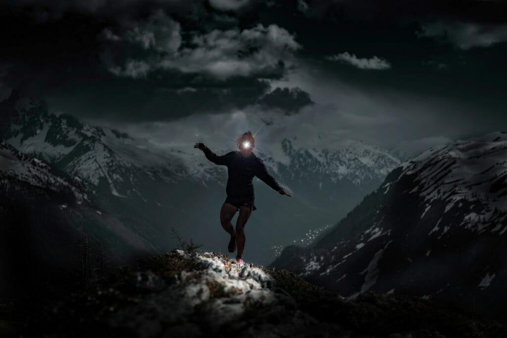 Trail runner in the dark with headlight