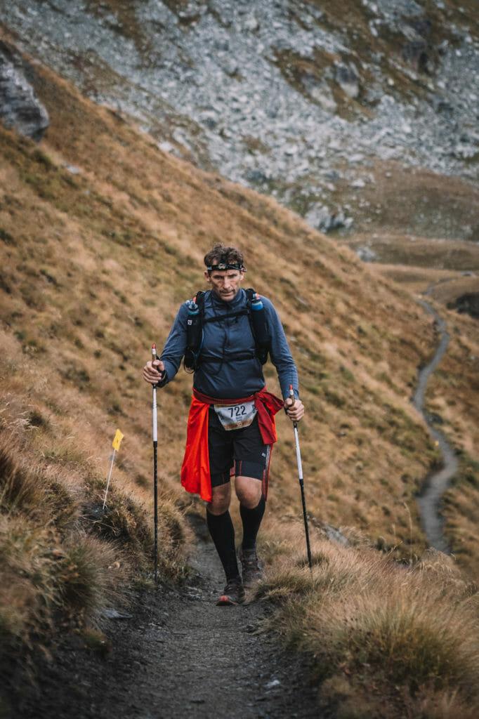 A runner moves through the Italian Alps.