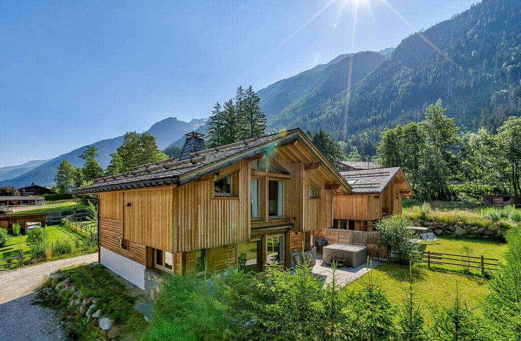 A deluxe chalet in Chamonix, France, shown from the outside.