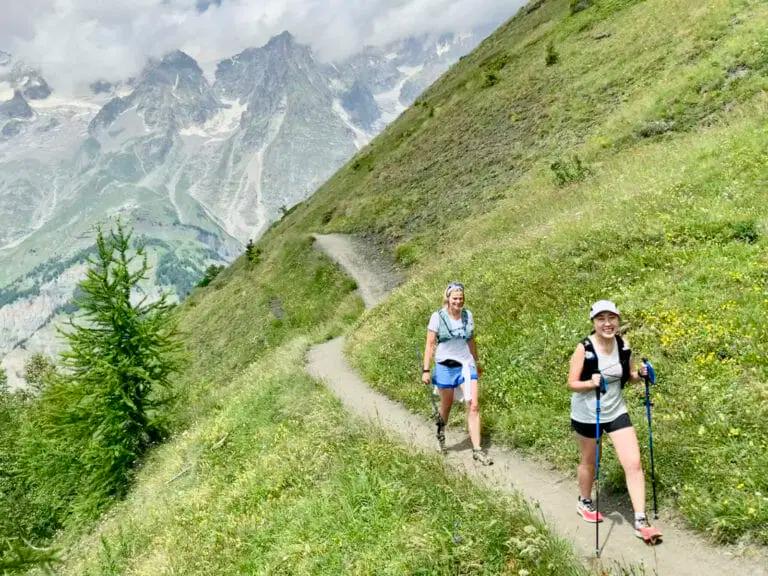 Two women on a trail in the Alps