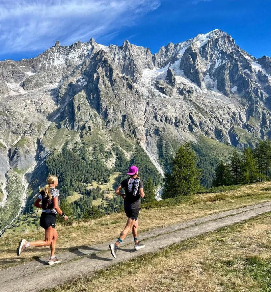 Two runners in Val Ferret, Italy on the UTMB