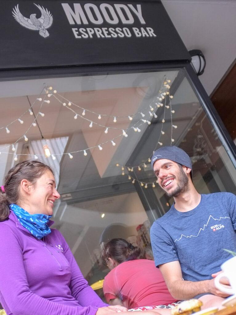 trail runners with coffee at moody espresso bar