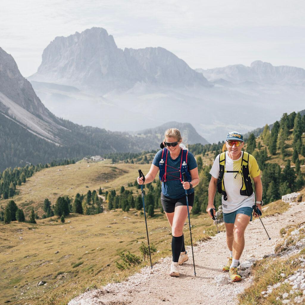 using poles on a trail in the Dolomites