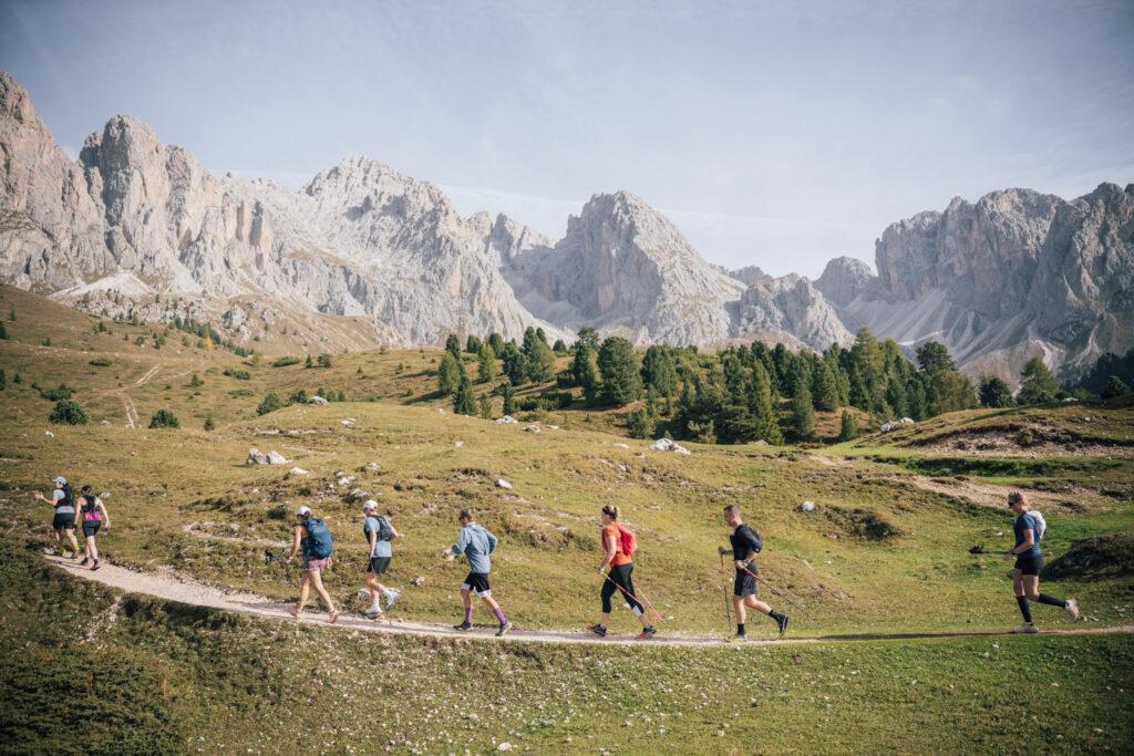 runners on a trail in the Dolomites