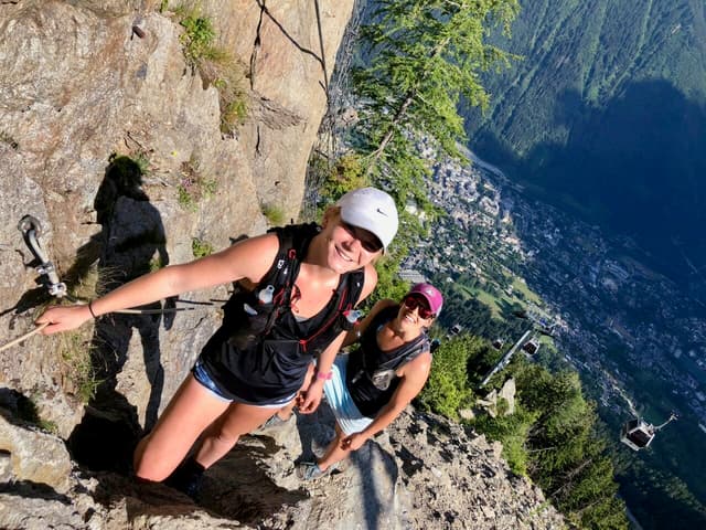 two runners on the Vertical Kilometer route in Chamonix, France