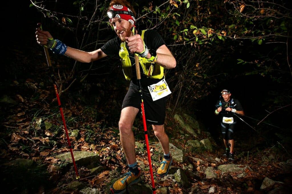 Grant Fulton running with headlight in the dark during the Ultra Trail Lago d'Orta, Italy