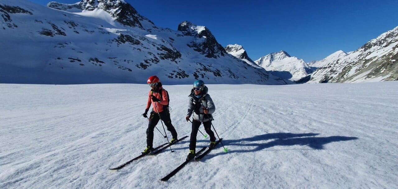 Gerardi and Fabre on skis on glacier during the Haute Route