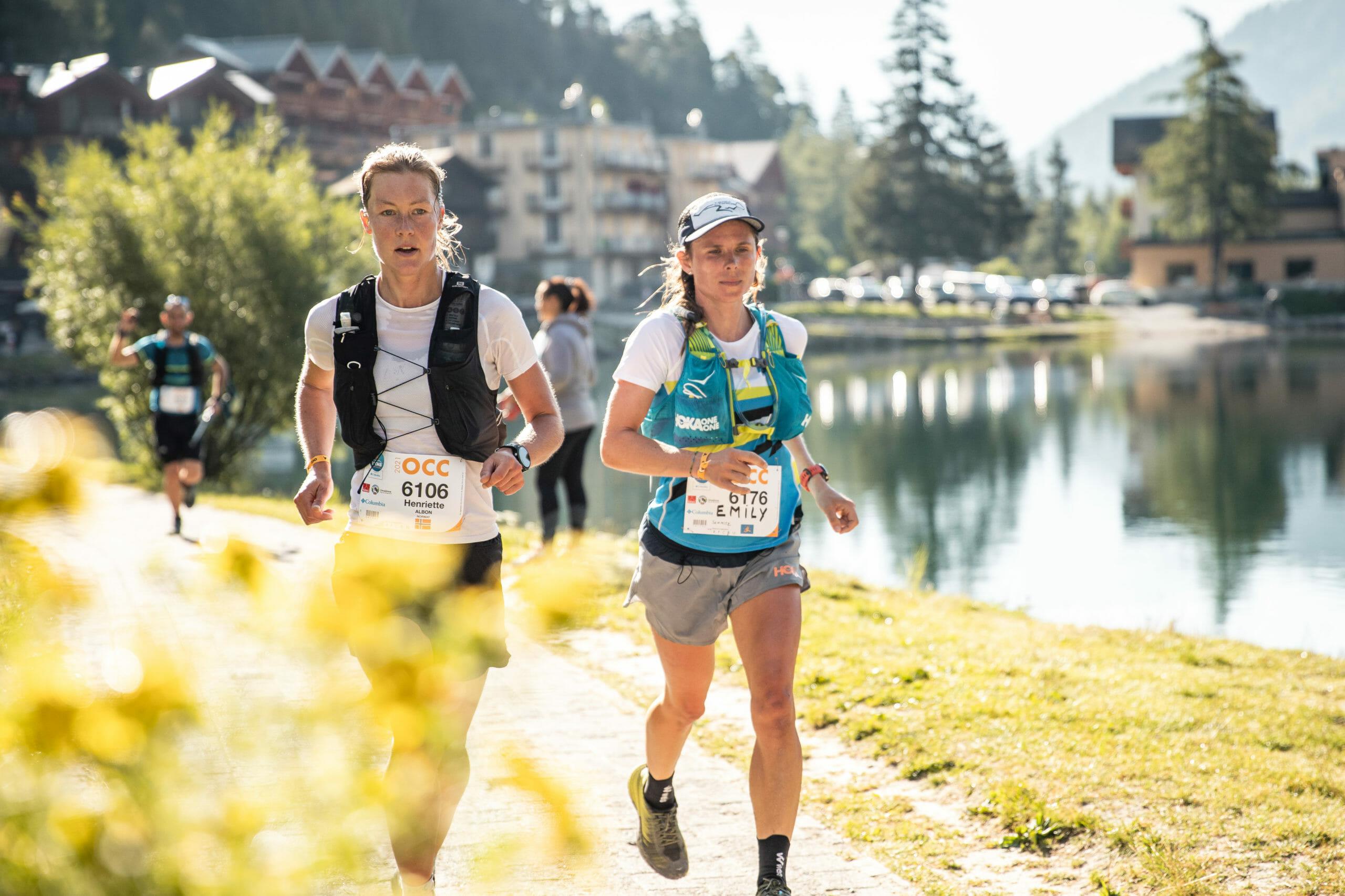 Emily Schmitz and another female trail runner running in the UMTB OCC race