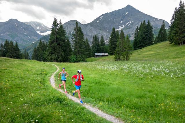 Two trail runners above Gstaad, Switzerland