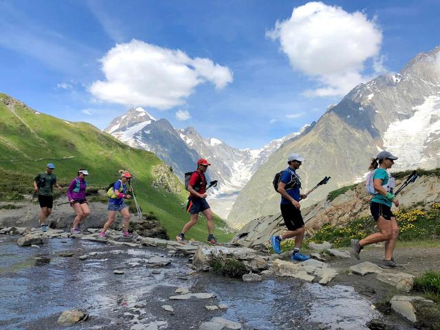 A group of trail runners in Val Ferret, Italy