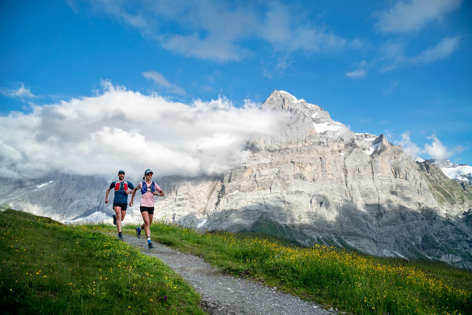 Trail running above Grindelwald, Switzerland, with the Wetterhorn in the background