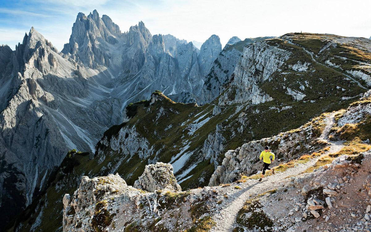 A woman running in the Dolomites near Cortina
