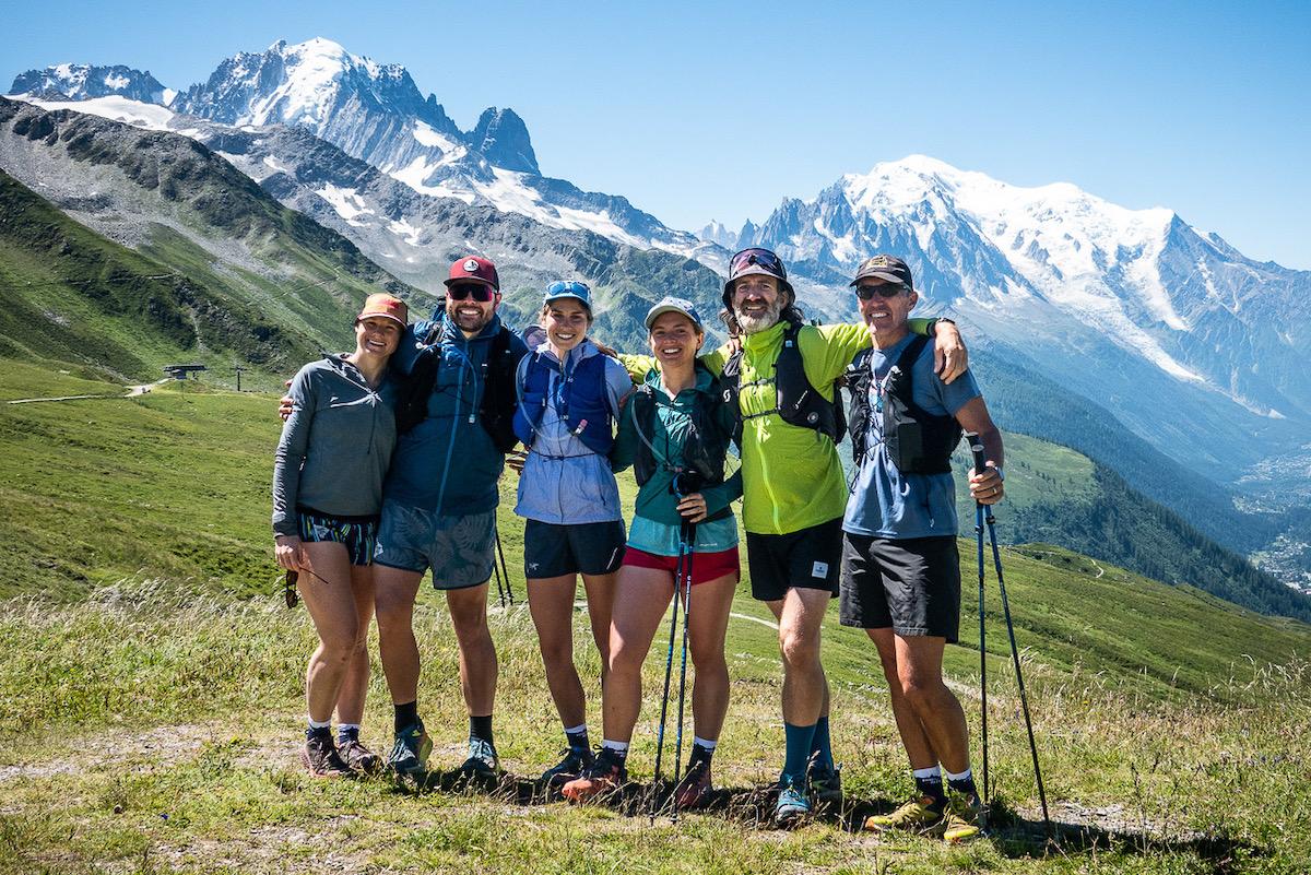 Run the Alps guide Al Crompton on the TMB with his group, with Mont Blanc in the background.